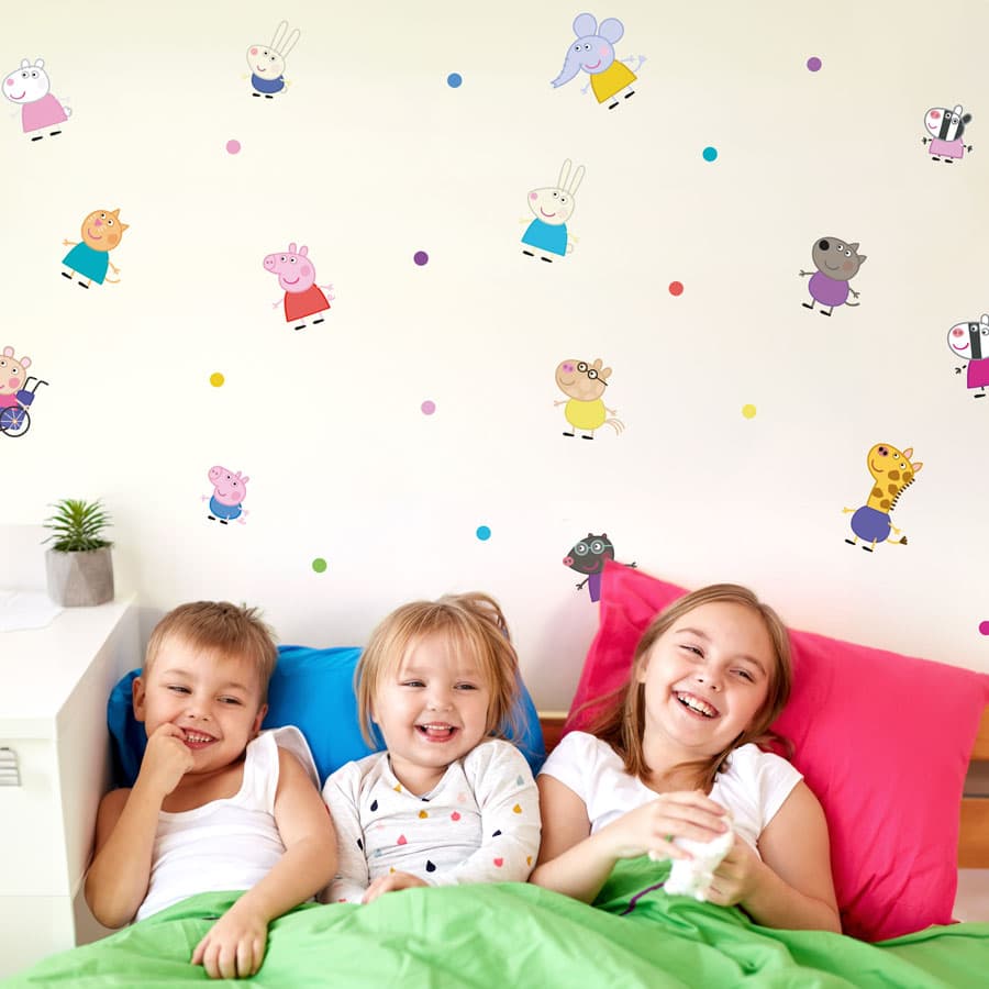 Peppa and Friends Wall Stickers above a children's bed